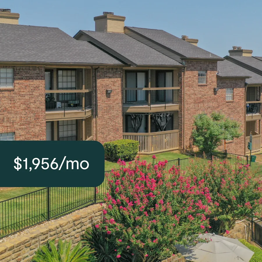 A square ad: brick garden apartments behind a bank of pink crape myrtle, a dark tab with the monthly rent.
