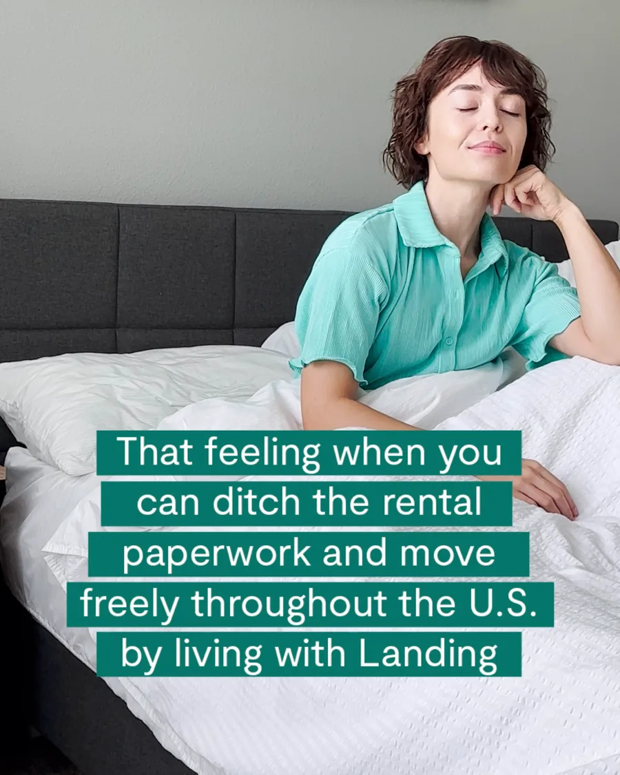 A video still: a woman rests her chin on her hand beside a white bed, eyes closed, a caption in green bars about ditching rental paperwork and moving freely.