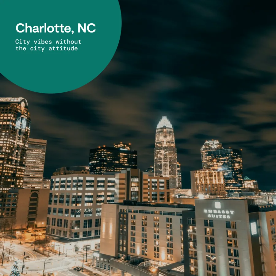 A square ad: a night skyline of lit towers, a green circle in the corner with the city's name and the line "City vibes without the city attitude".