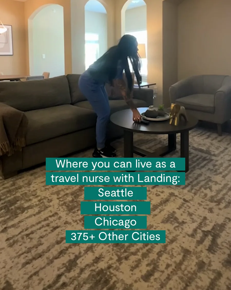 A video still: a woman sets a dish on a coffee table in a furnished living room, captions in green bars listing three cities and hundreds more.